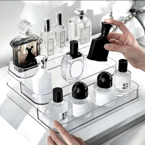 Organizador de perfumes transparente multinível mantendo cosméticos organizados e visíveis na penteadeira